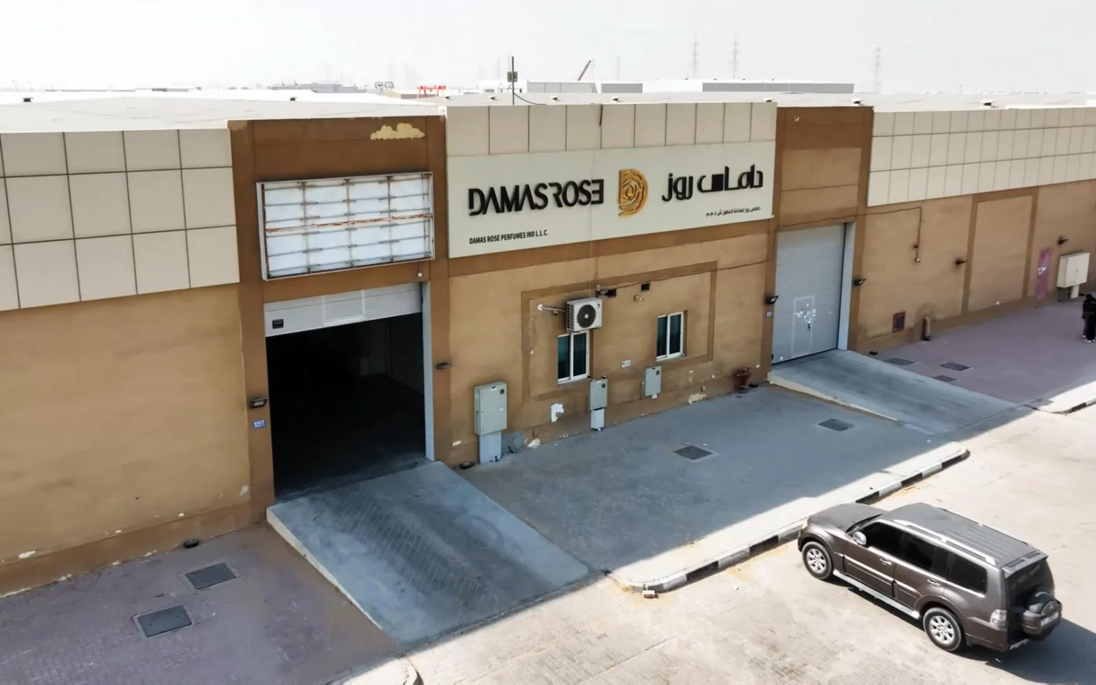 Exterior of the Damas Rose Perfumes facility with the Damas Rose sign
